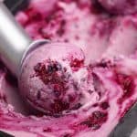 Close-up of a scoop of boysenberry ice cream.