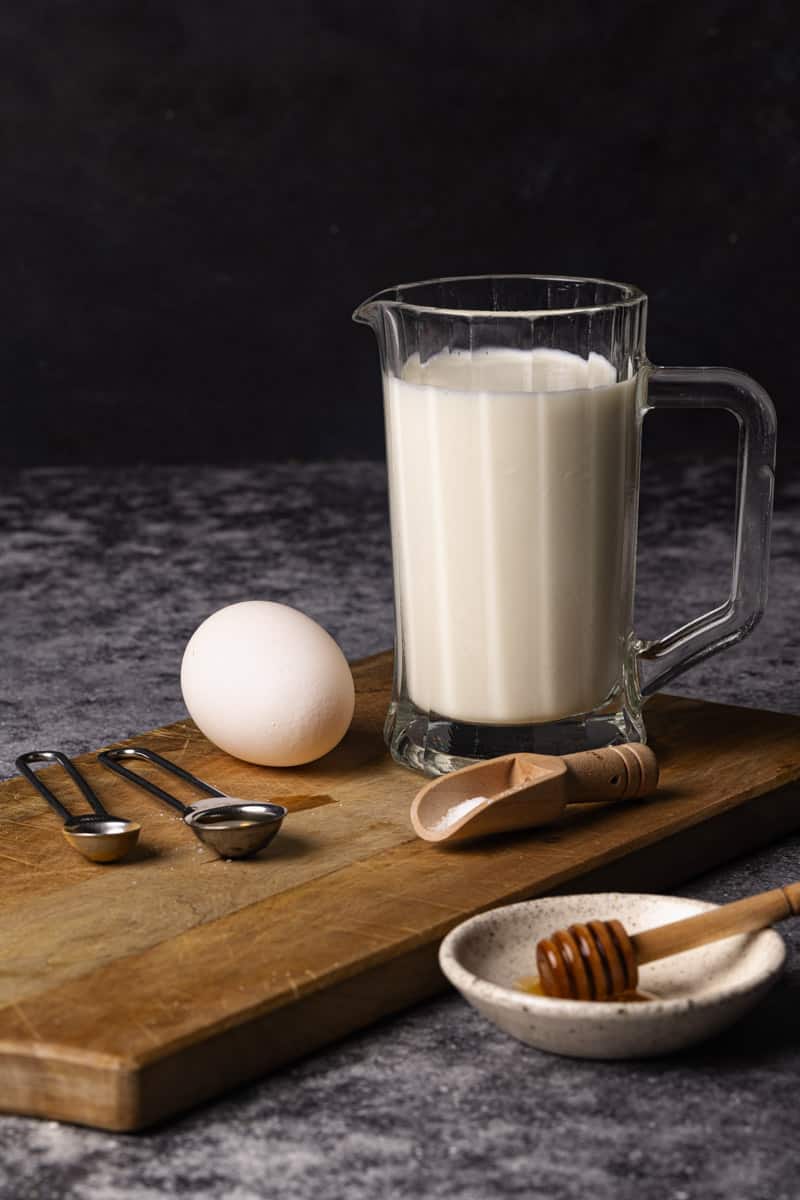 Ingredients for a single-serve creamy egg milk drink.