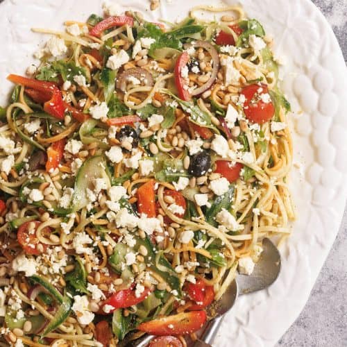 Linguine salad on a large white serving platter.