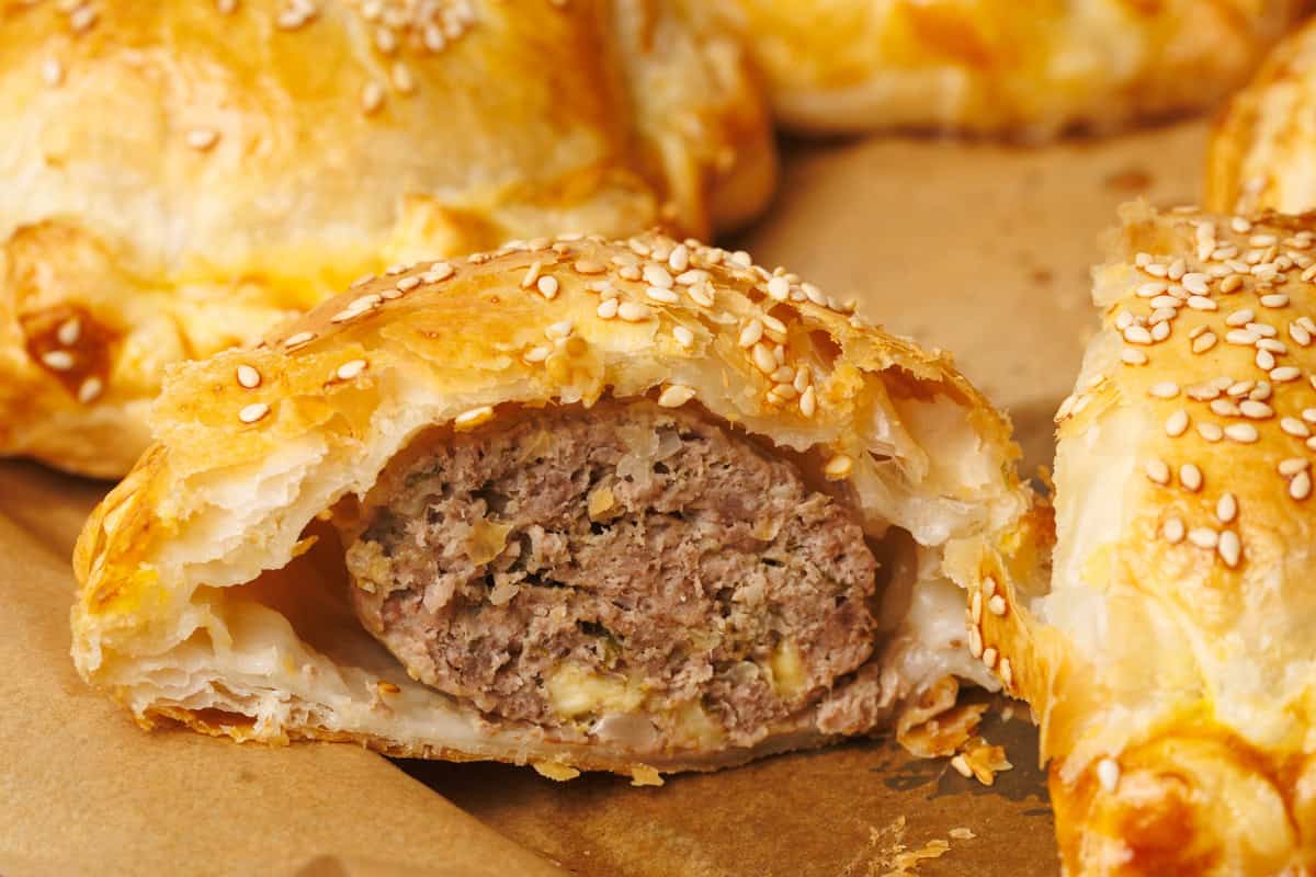 A small lamb wellington cut open.