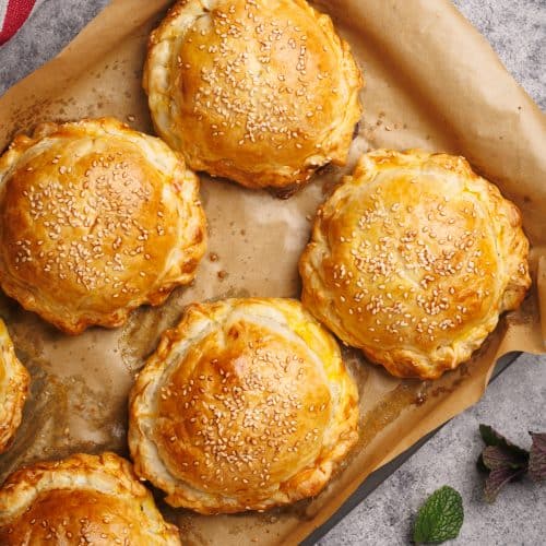 Beef wellington on a baking tray.