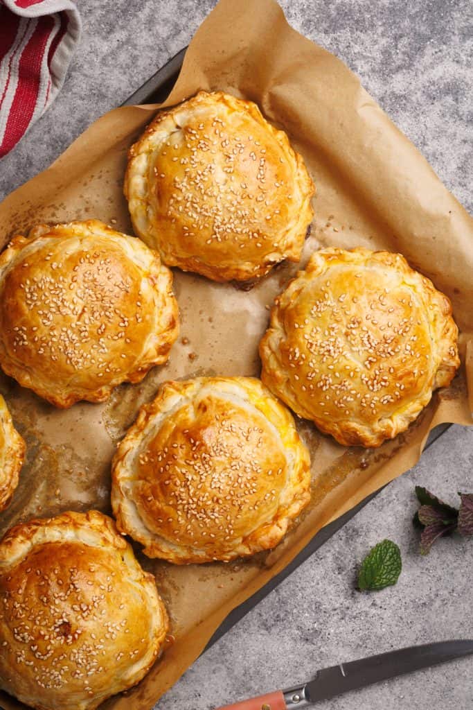 Beef wellington on a baking tray.