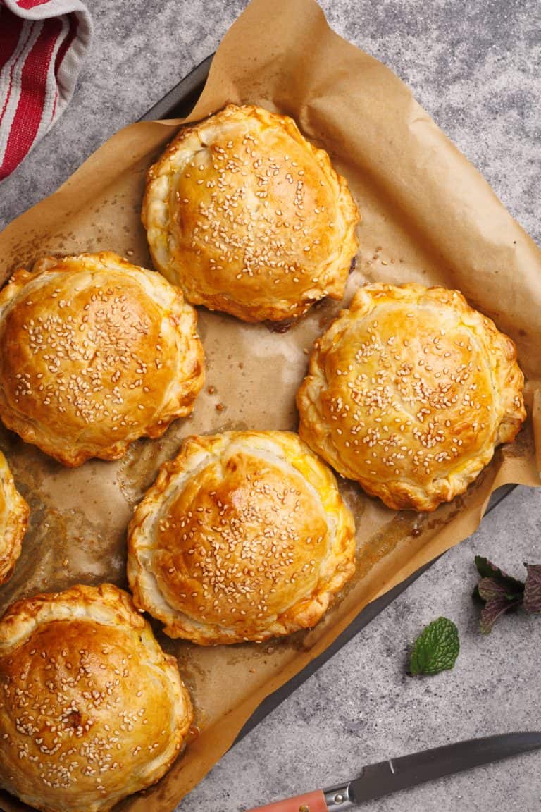 Beef wellington on a baking tray.