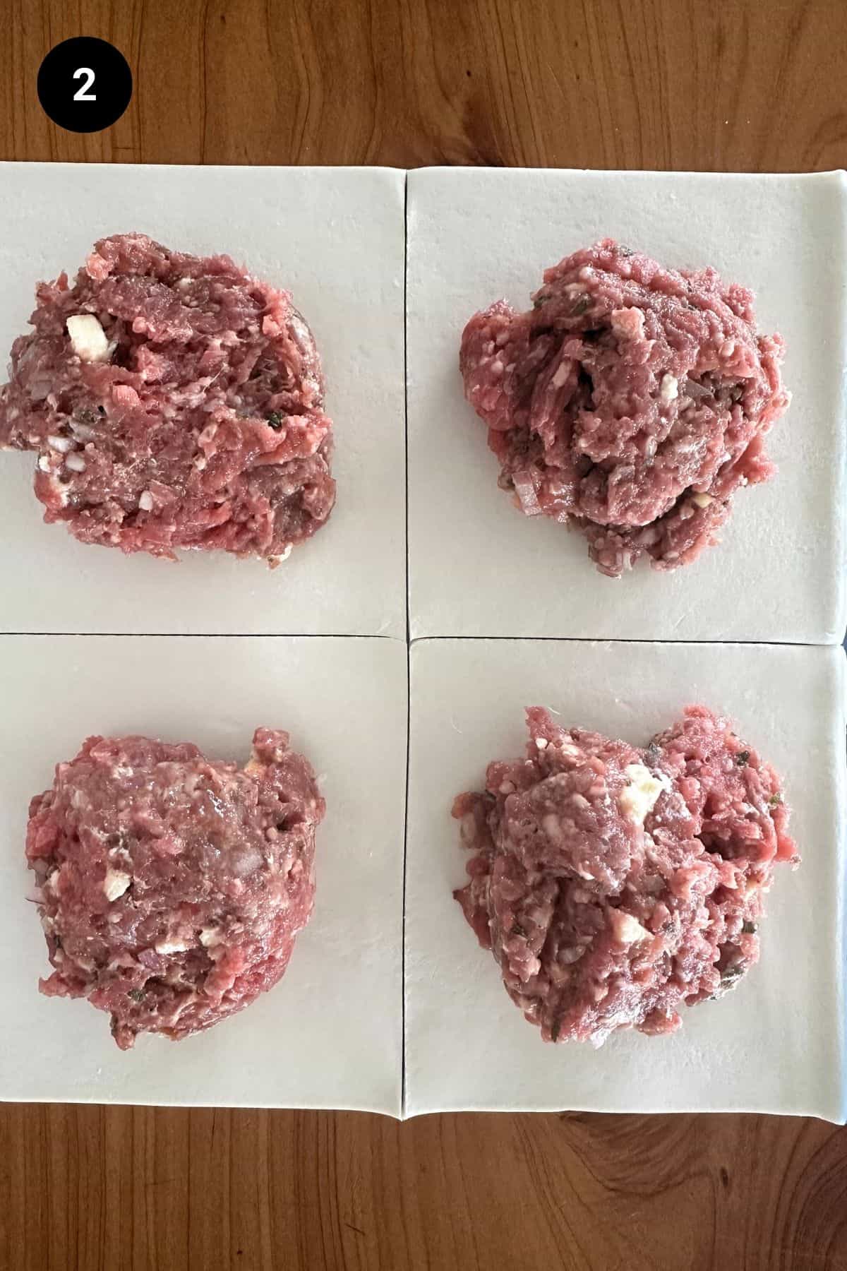 Filling added to pastry for a single serve lamb wellington.