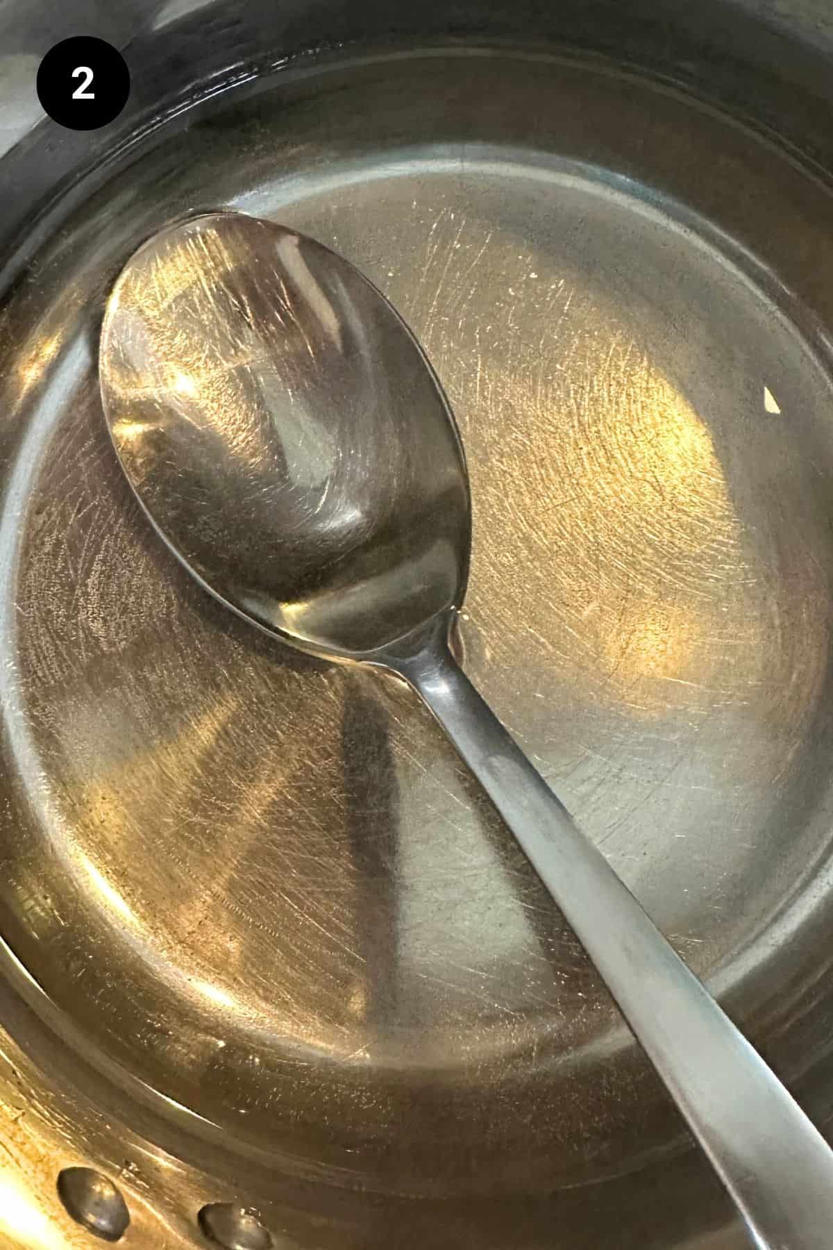 Simple syrup in a saucepan.