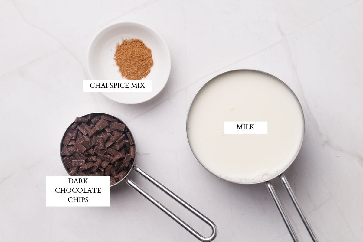Ingredients laid out to make chai hot chocolate.