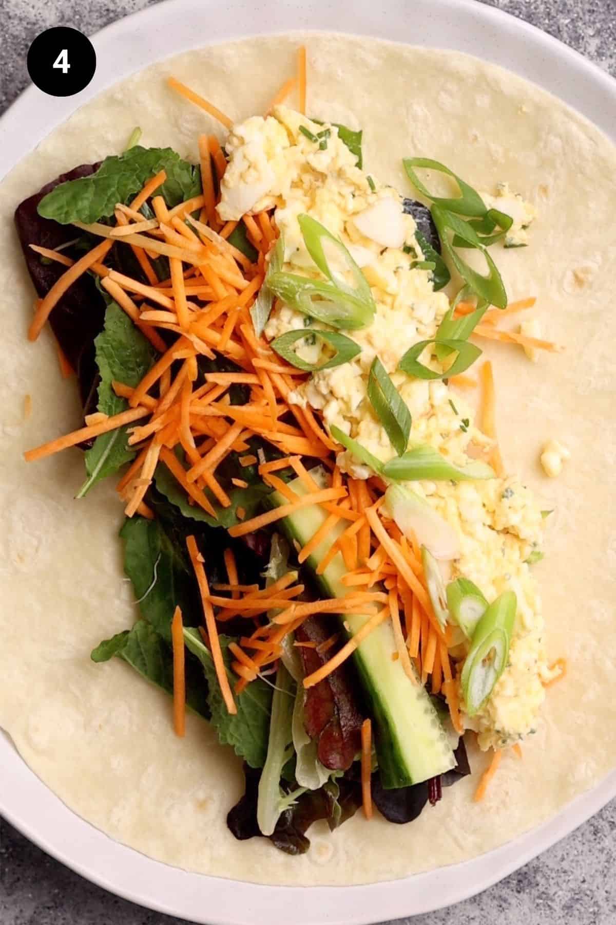 Open wrap with egg salad filling.
