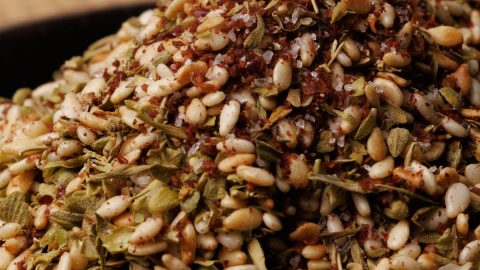 Homemade za'atar in a wooden bowl.