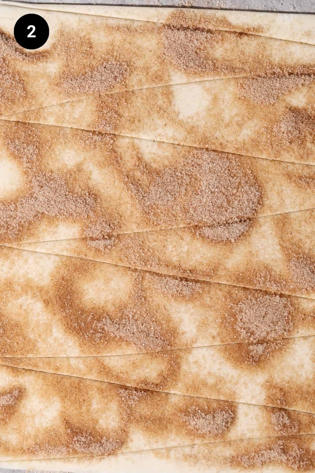 Puff pastry cut into triangles, dusted with cinnamon sugar.