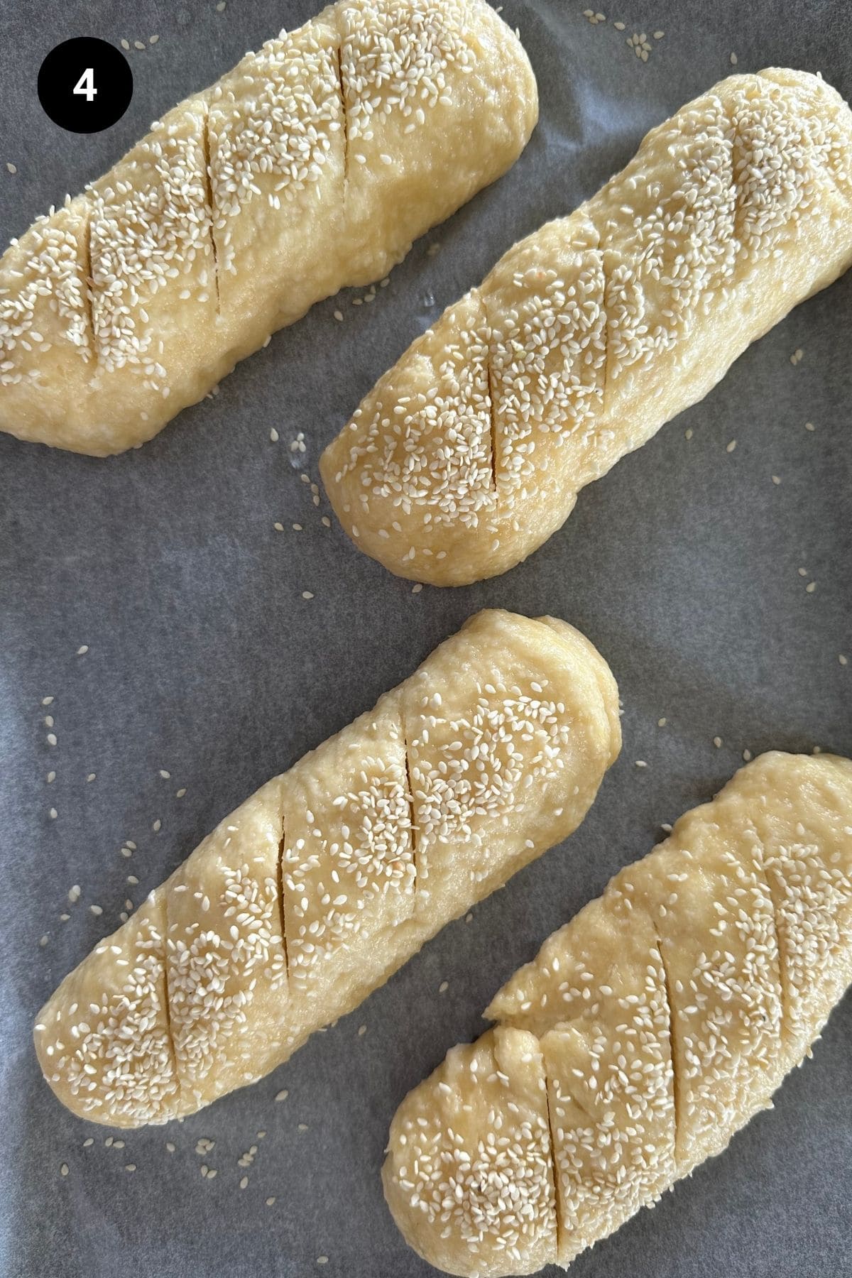Pretzel buns ready to be baked.