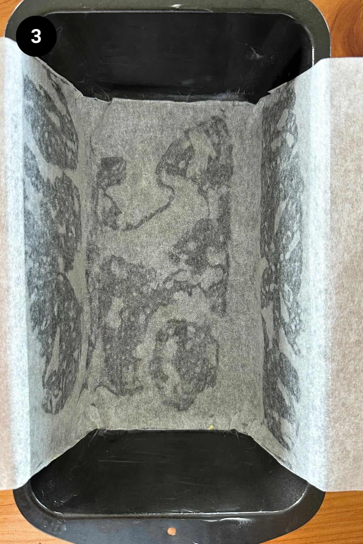 A greased and lined loaf tin.