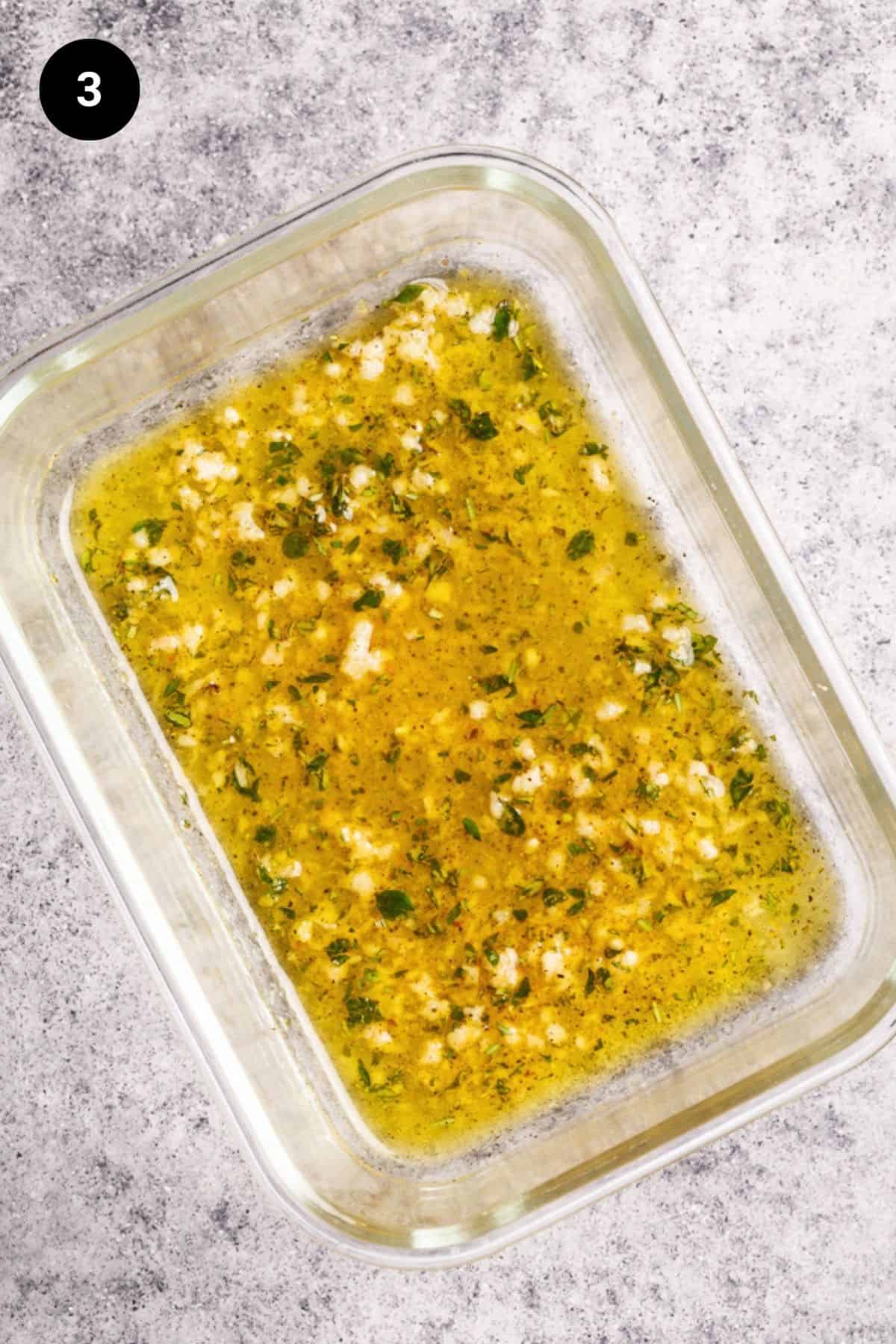 Marinade in a glass container.