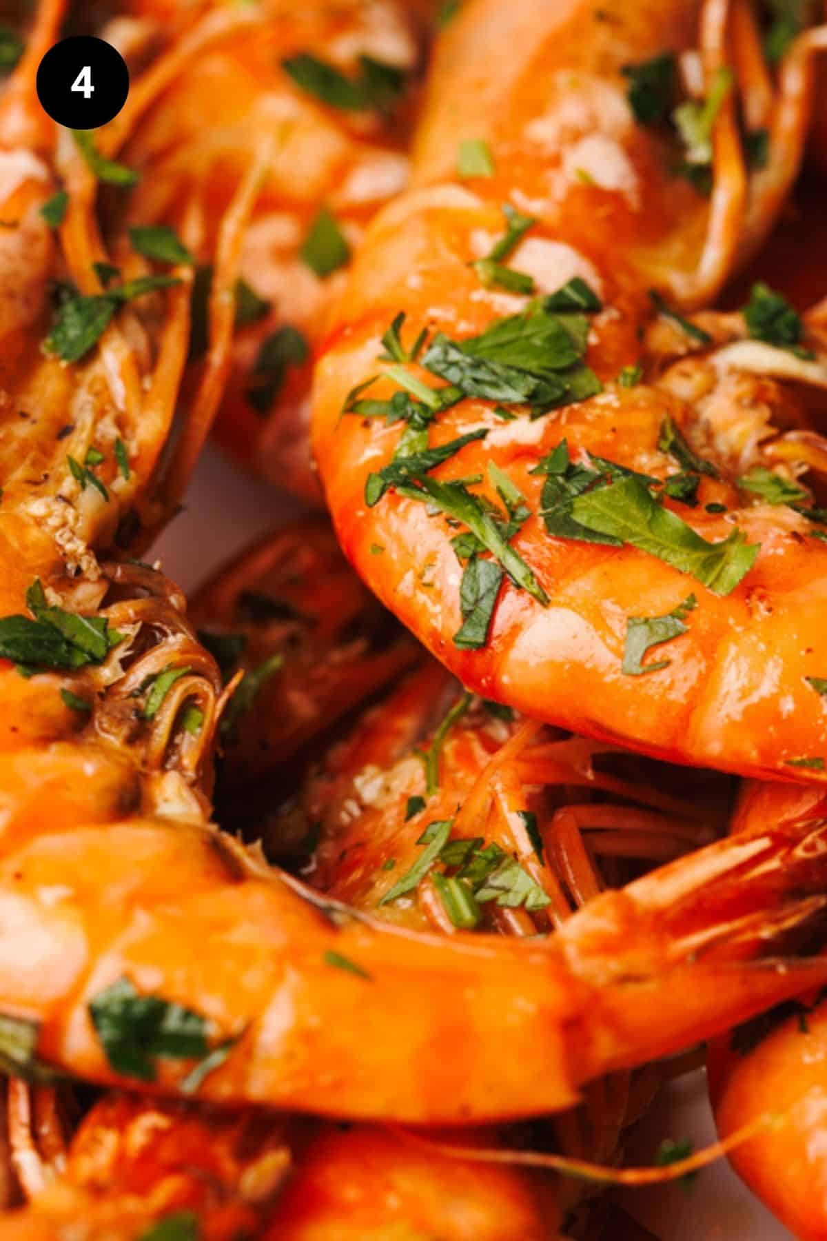 Cooked tiger shrimp tossed in garlic olive mixture.