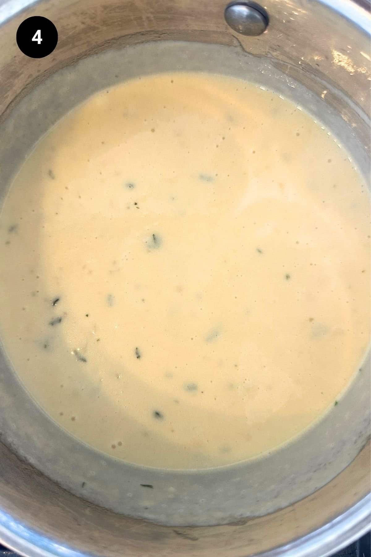 Heavy cream has been added to the garlic sauce.