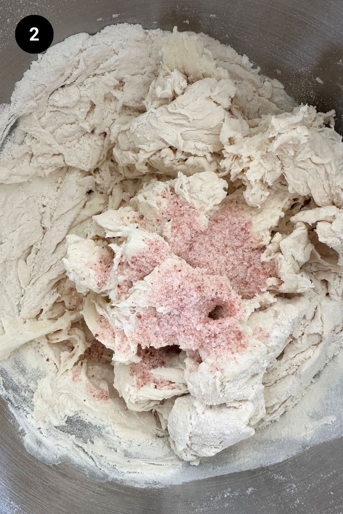 Shaggy dough in metal bowl.