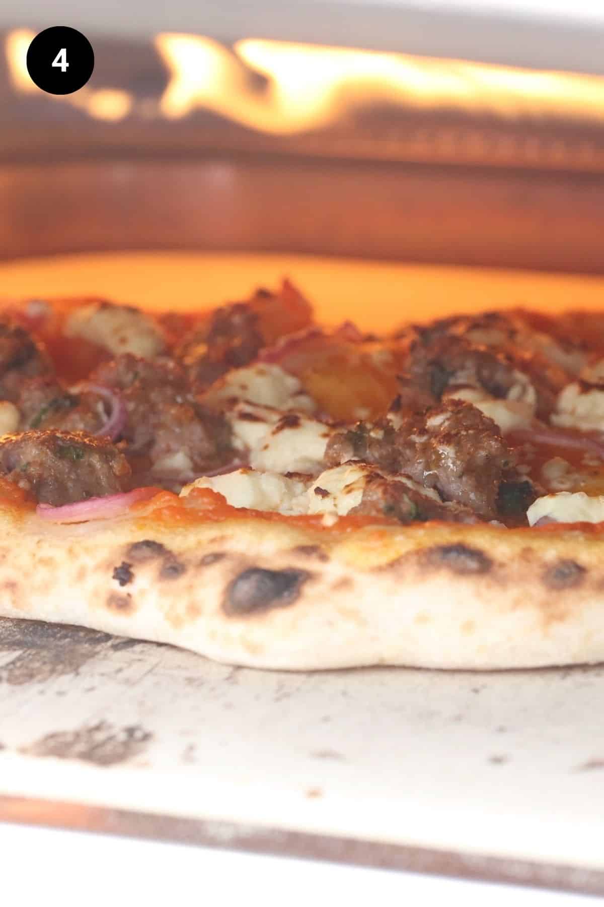 Pizza being baked in the Ooni pizza oven.