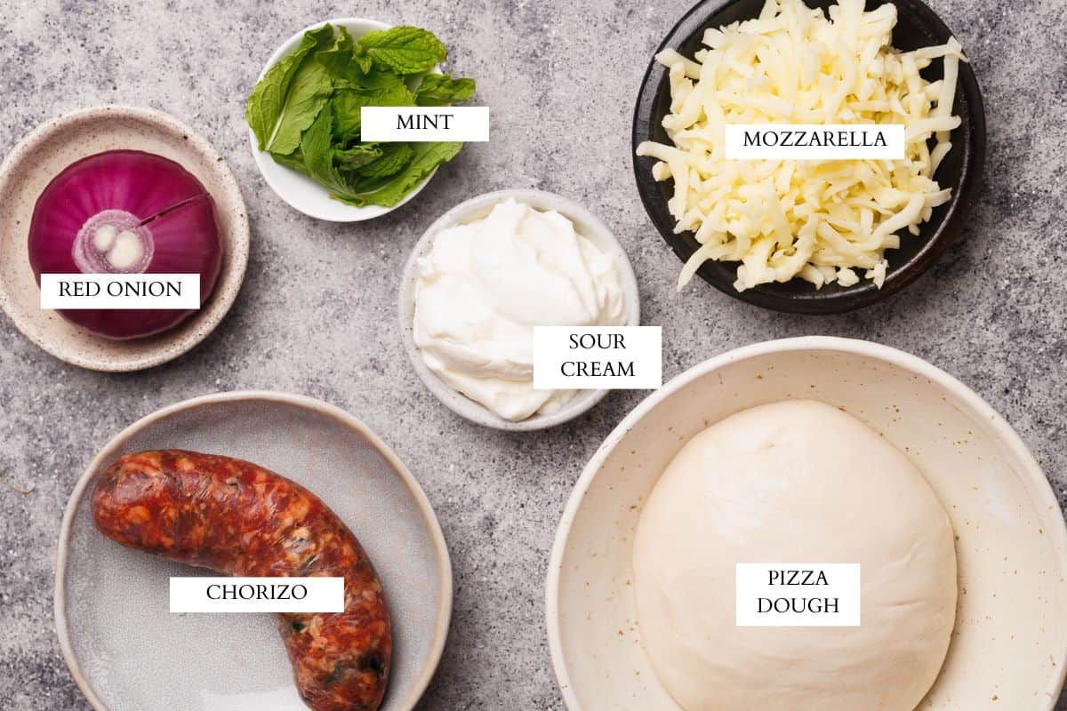 Ingredients laid out to make German pizza.