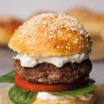 Hamburger on a wooden board.