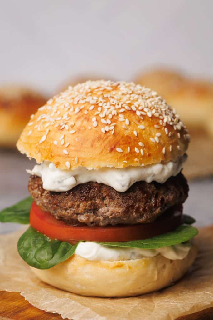 Hamburger on a wooden board.