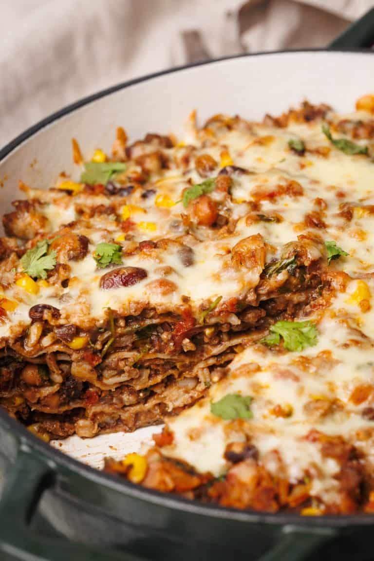 Close-up view of the Mexican Lasagna with a slice taken out of it.
