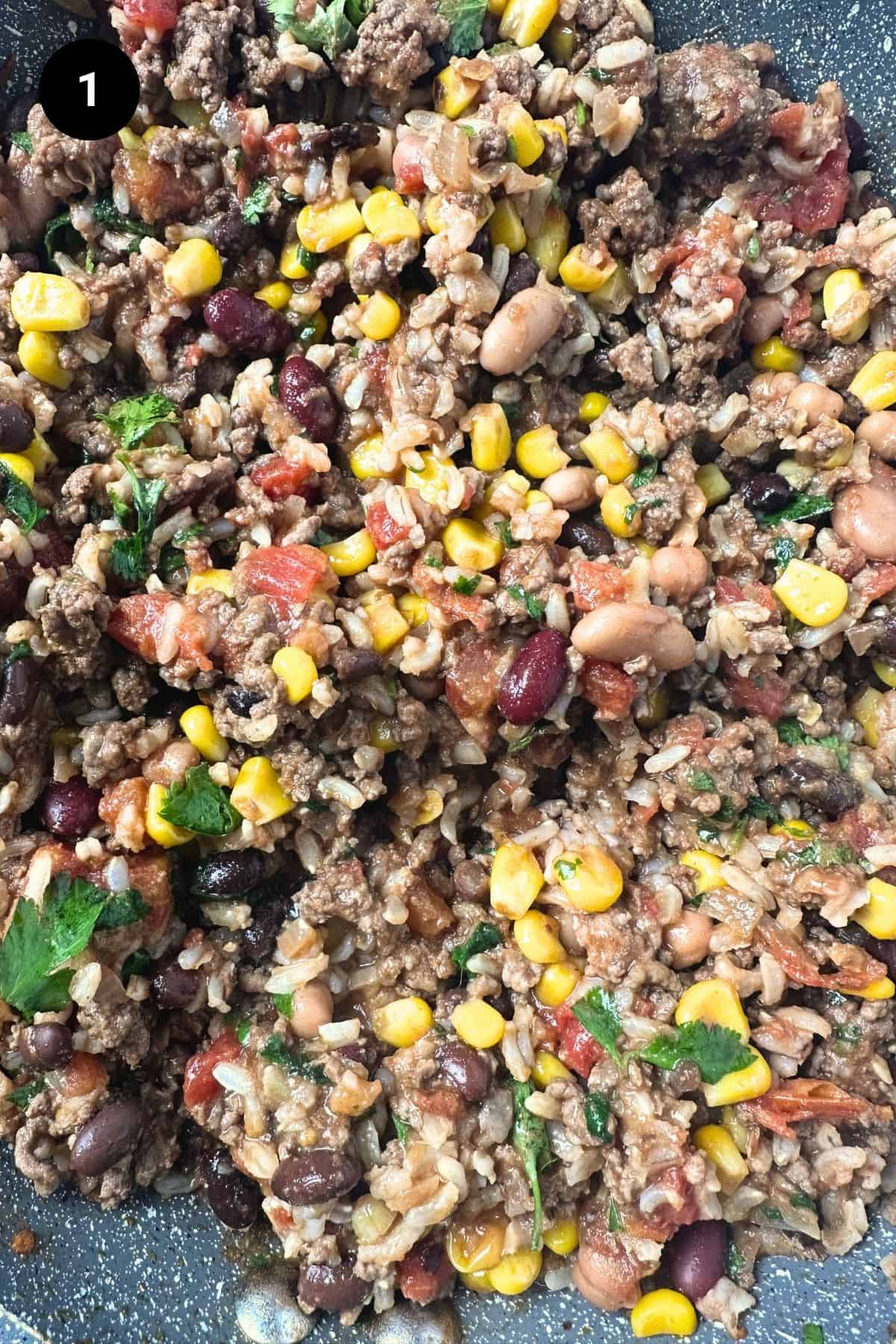 Mexican lasagna filling in a pan.