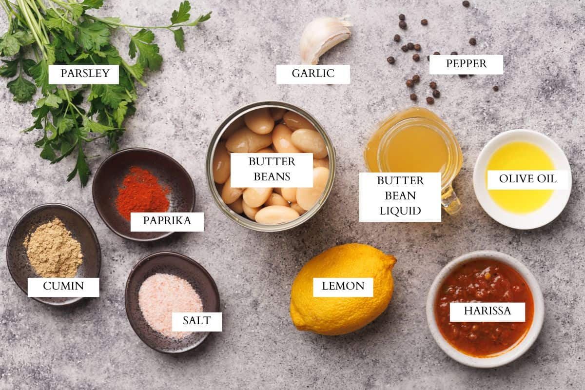 Ingredients laid out to make harissa hummus.