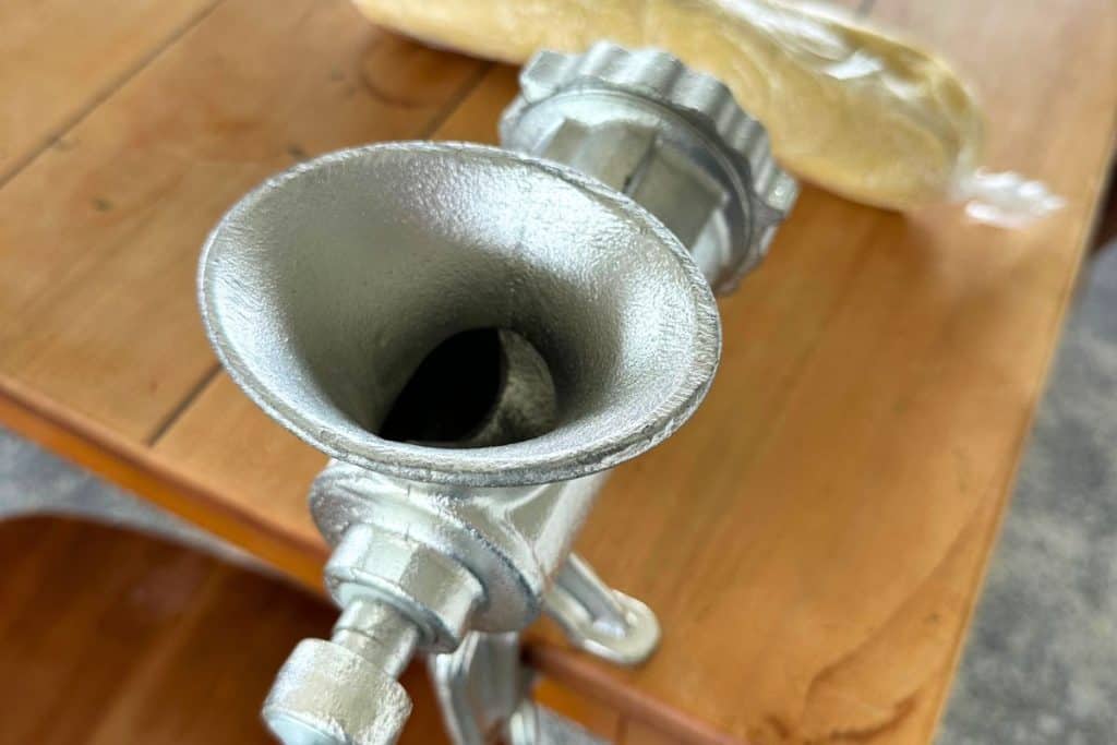 Meat grinder with cookie attachment.